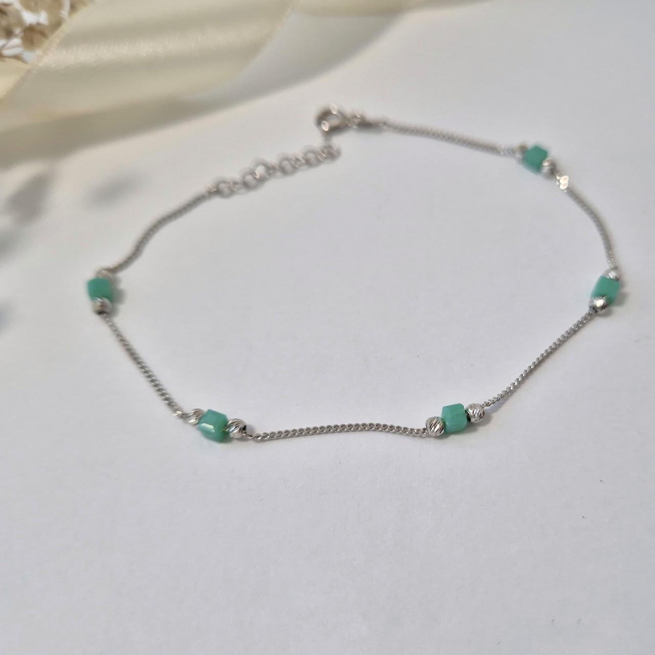 Браслет с шариками и голубыми камнями серебро 925 пробы родированное 1,28 г 18,5-20,5 см (6393г)