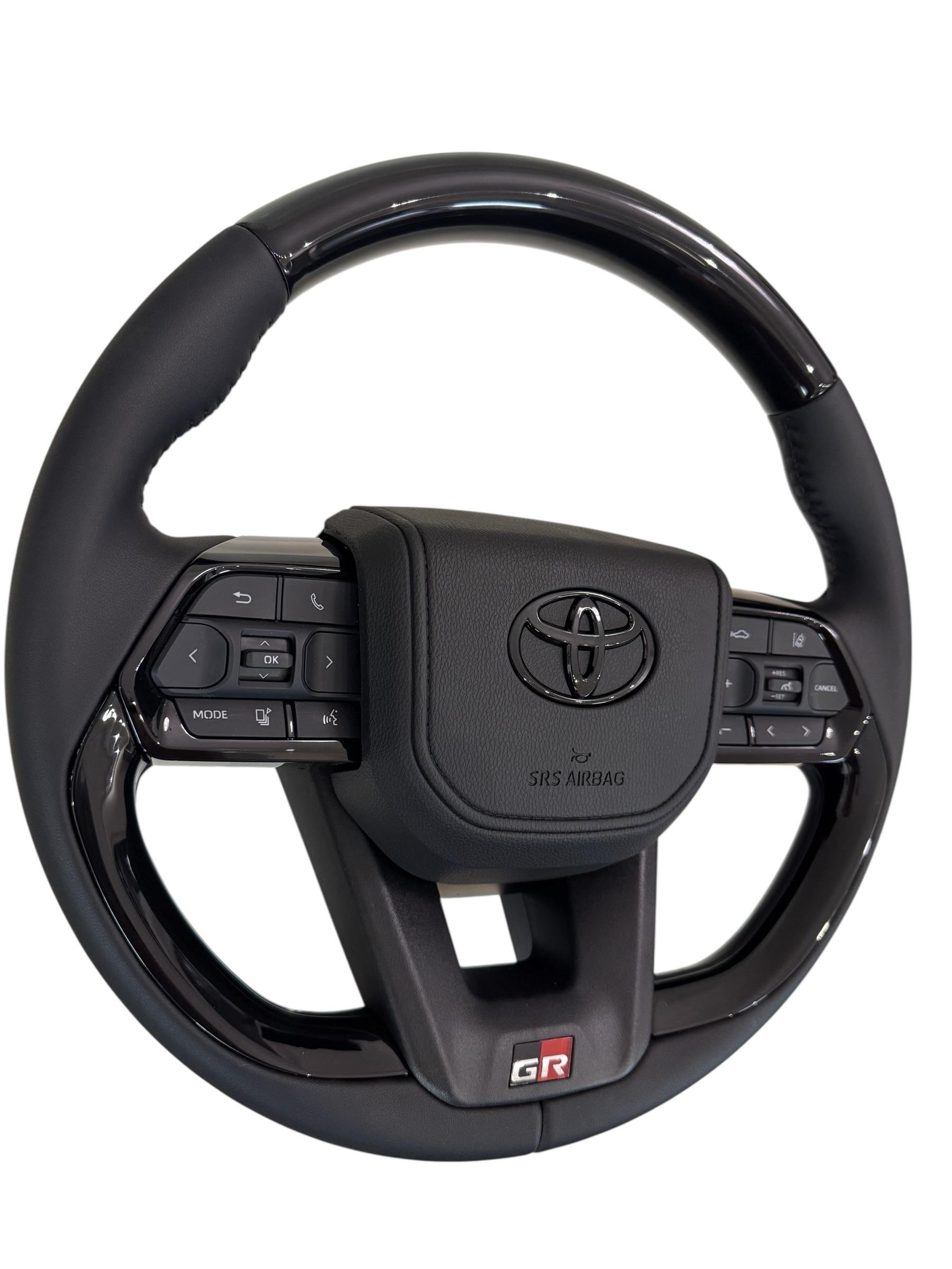 Руль для Toyota Land Cruiser 200/Prado 150 GR в сборе лакальный лакальный в стиле LC300 логотип черный глянец (29621045) - фото 5