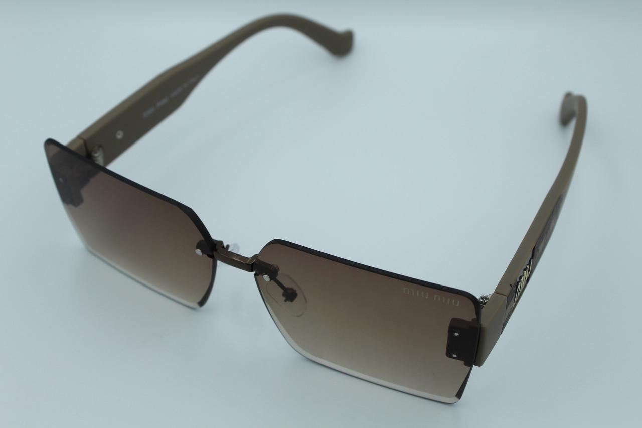 Сонцезахисні окуляри жіночі дизайнерські (58094 №1) - фото 4 Сонцезахисні окуляри жіночі дизайнерські (58094 №1) - фото 4