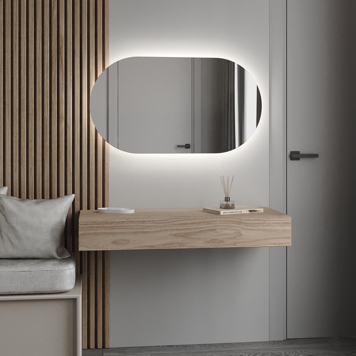 Зеркало фигурное подвесное с LED-подсветкой Лиль 1200x600 мм и кнопочным управлением