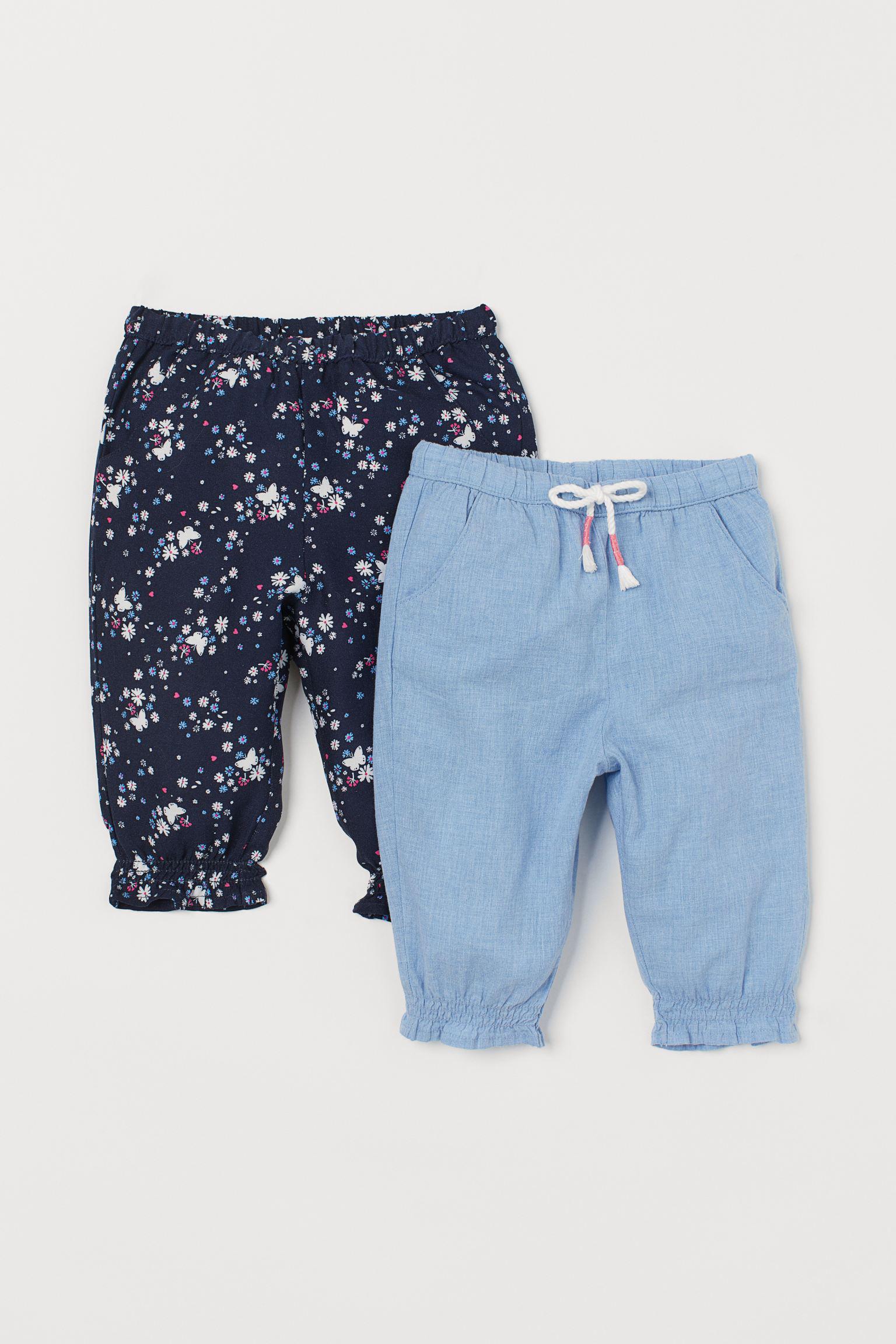 Брюки H&M Цветы 68 см 2 шт. Голубой/Синий (1307756631012) Брюки H&M Цветы 68 см 2 шт. Голубой/Синий (1307756631012)