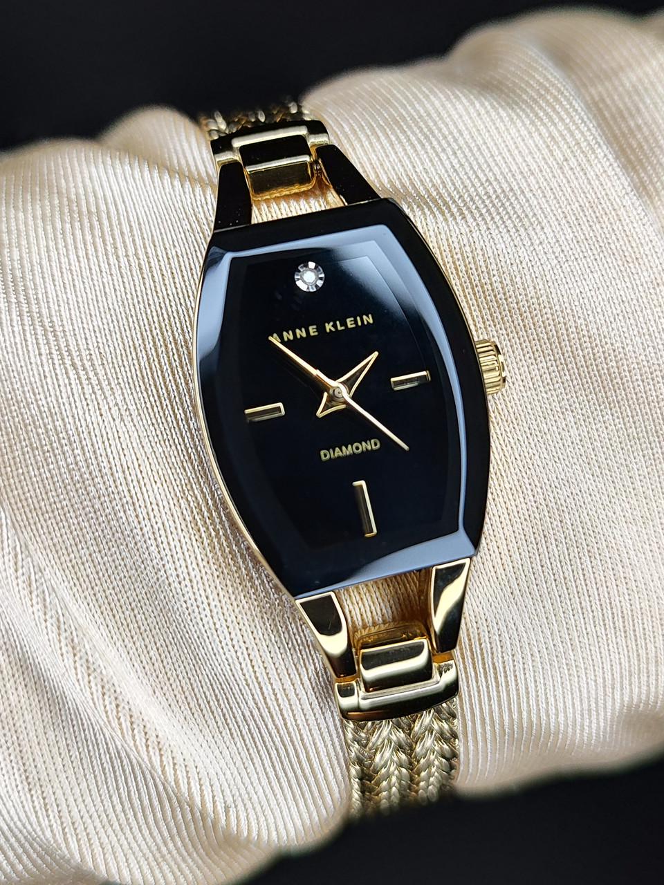 Наручные часы женские Anne Klein AK/2184BKGB с черным циферблатом и золотистым стальным браслетом