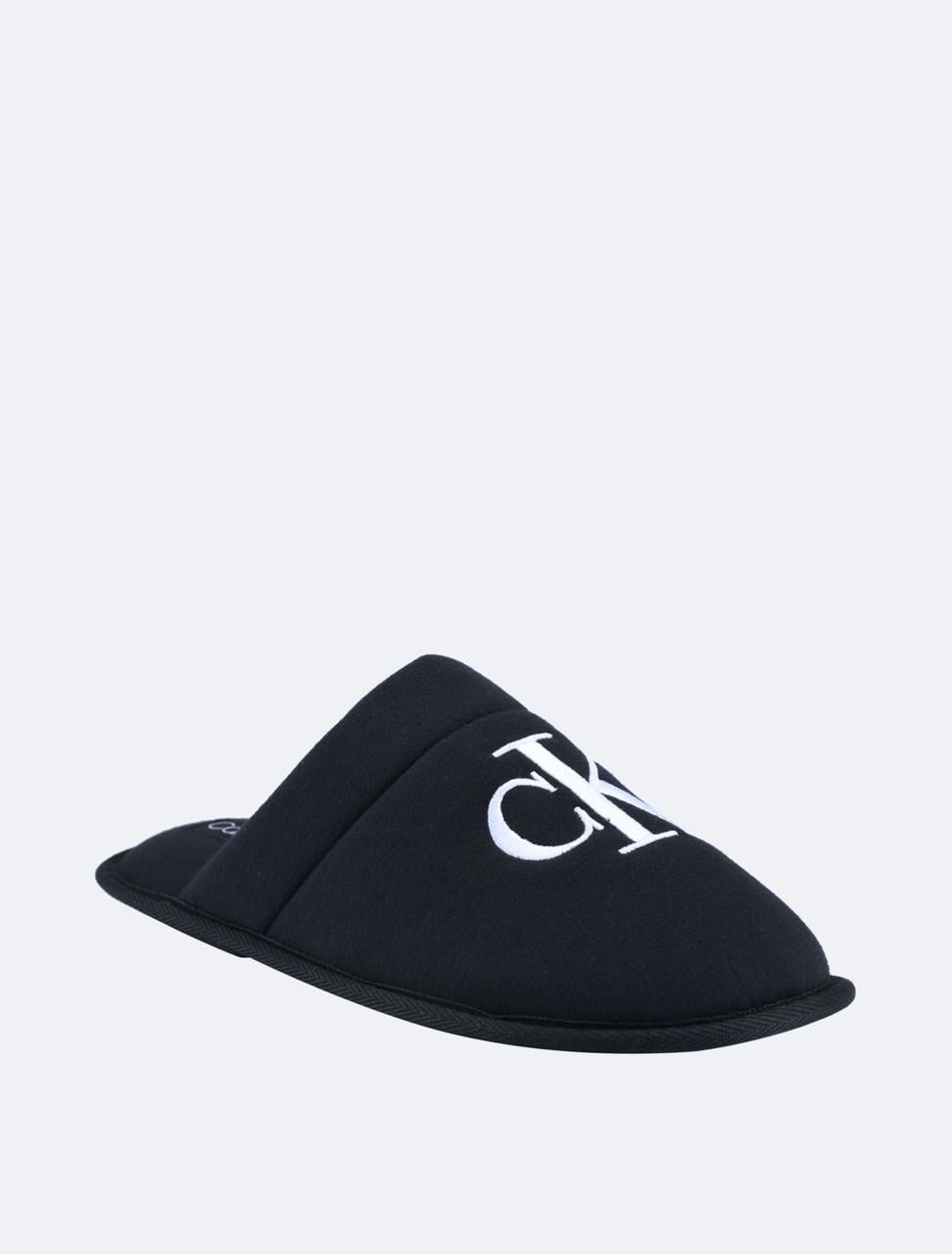 Домашні тапочки чоловічі Calvin Klein Xenith Slipper р. 43 Чорний (2510312351) Домашні тапочки чоловічі Calvin Klein Xenith Slipper р. 43 Чорний (2510312351)