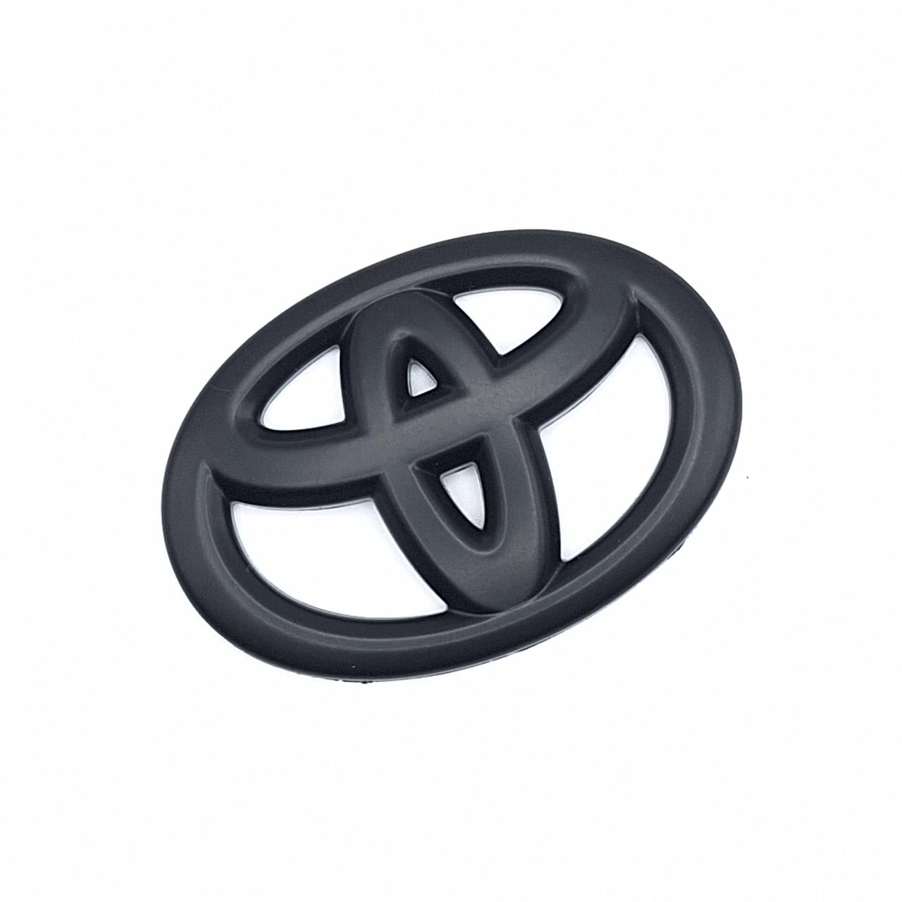 Накладка на эмблему руля Toyota 67х47 мм Черный матовый (2072401309)