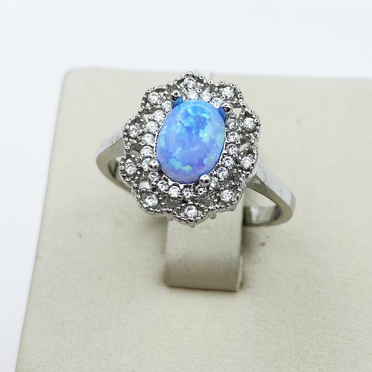 Кольцо серебряное с голубым опалом р. 18,5 3,13 г (1918813166)