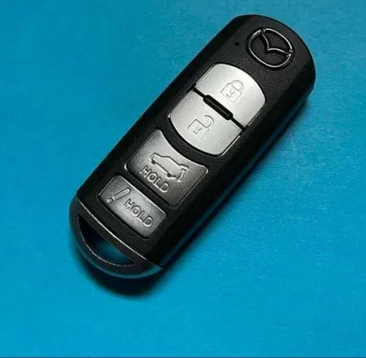 Смарт-ключ SKE13D02 Mazda CX5/CX3/CX9 с чистым жалом (KF4-0129)
