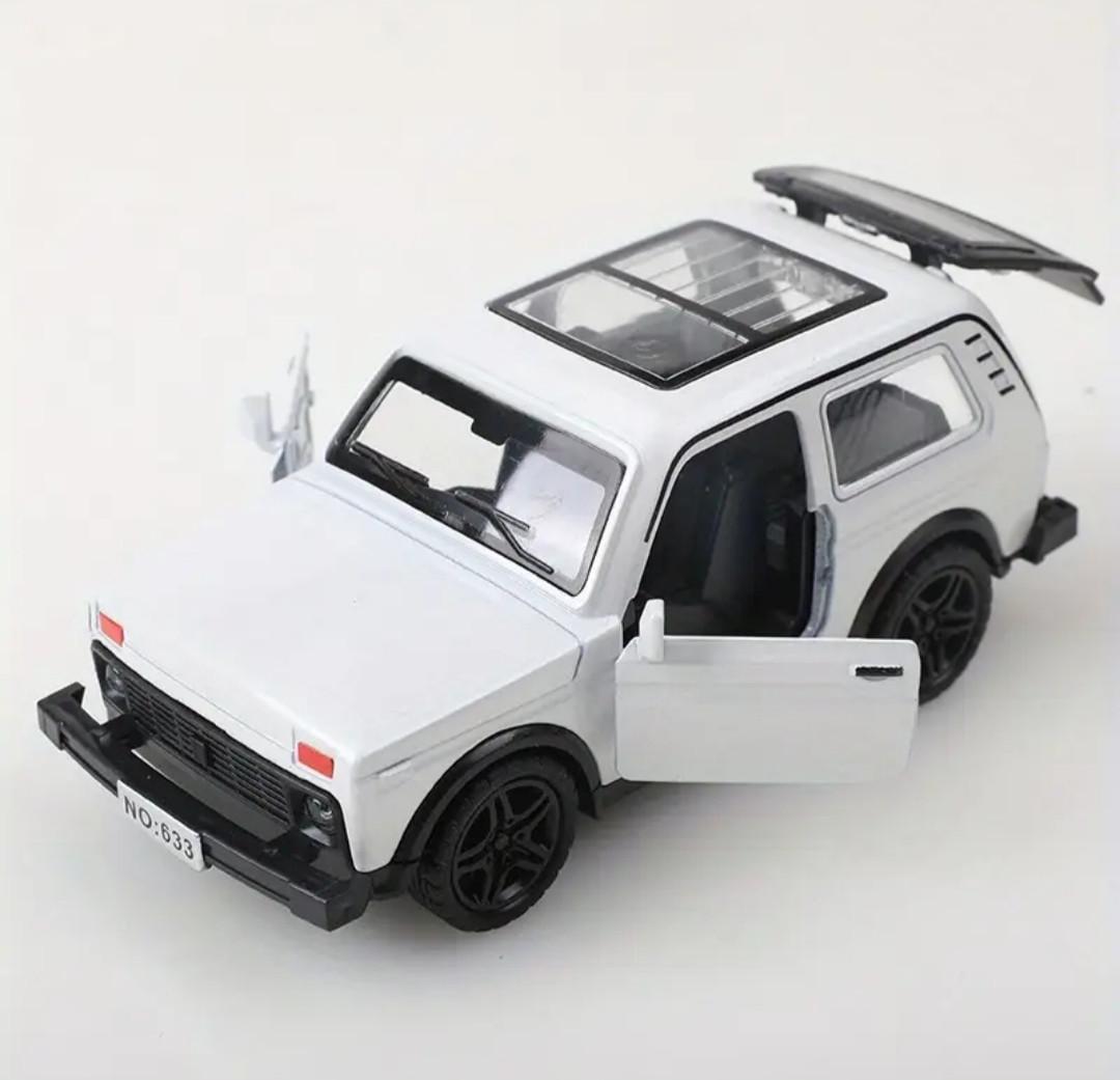 Іграшкова машинка металева Lada Niva 4x4 з дверями що відчиняються та люком 1:32 Білий (27829515)