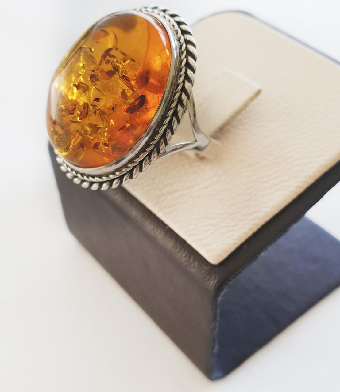 Кольцо серебряное с янтарем р. 18 9,21 г (1531692242)