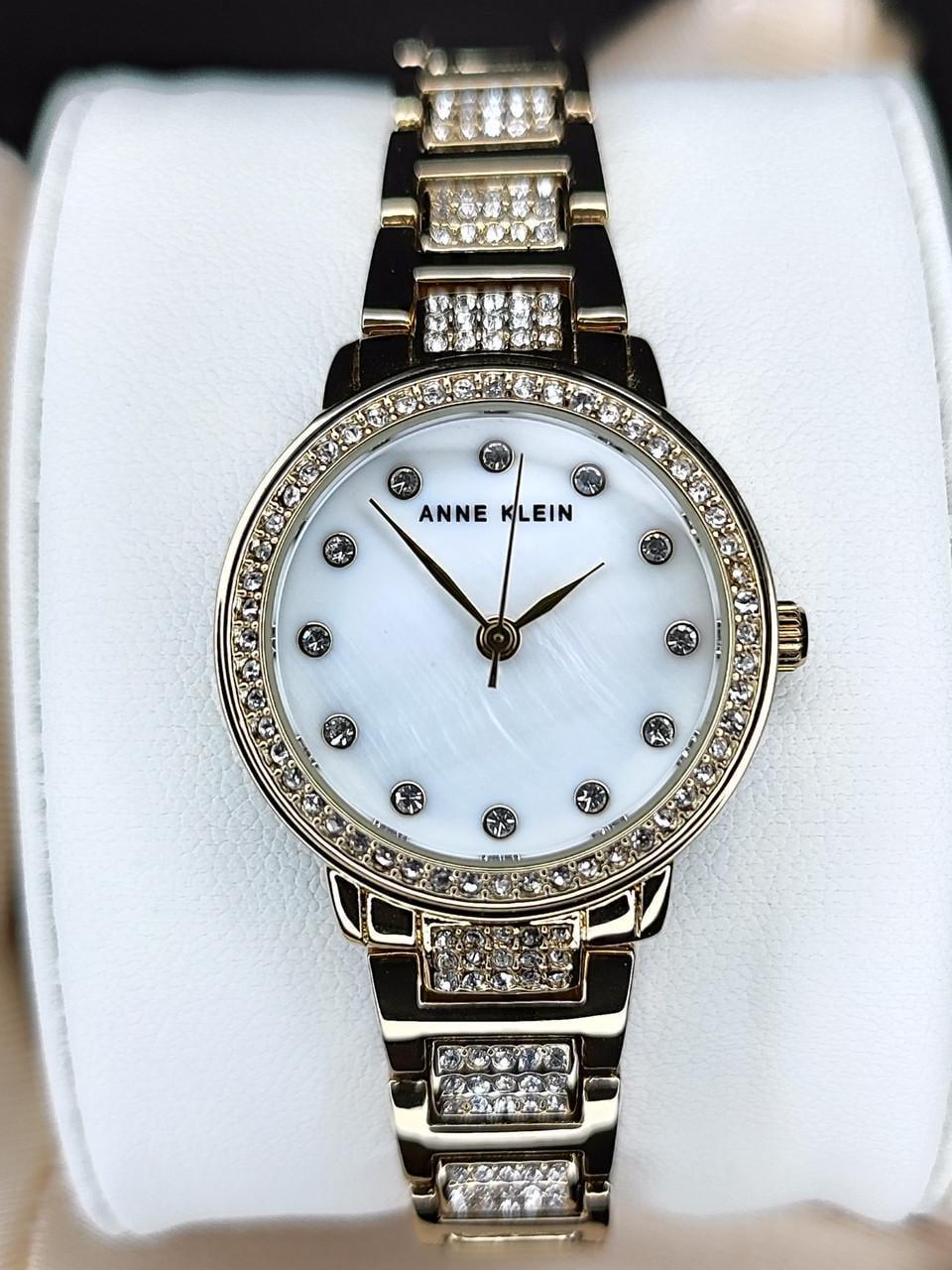 Наручные часы женские Anne Klein AK/5104MPGB с перламутровым циферблатом и золотистым стальным браслетом