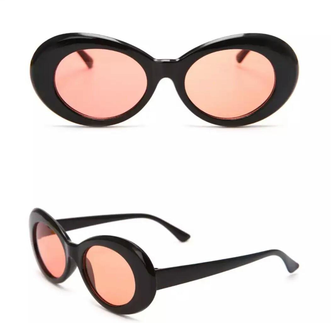 Солнцезащитные очки овал Белый с черным Черный с оранжевым