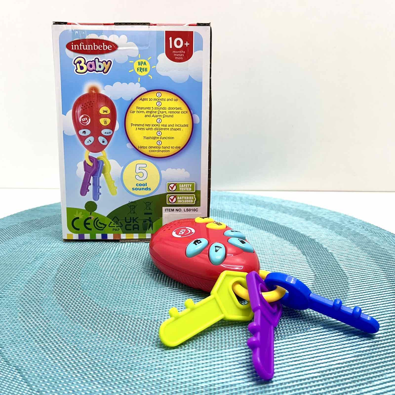 Гра розвиваюча брелок з ключами світло/звук Червона (LS010C) Гра розвиваюча брелок з ключами світло/звук Червона (LS010C)