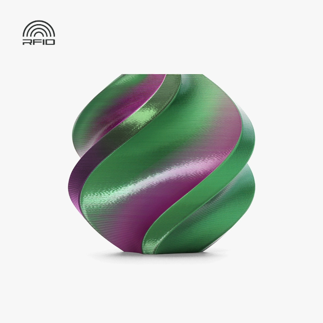 Пластик Bambu Lab PLA Silk с RFID меткой и катушкой Lights Northern Green/Purple (13913) Пластик Bambu Lab PLA Silk с RFID меткой и катушкой Lights Northern Green/Purple (13913)