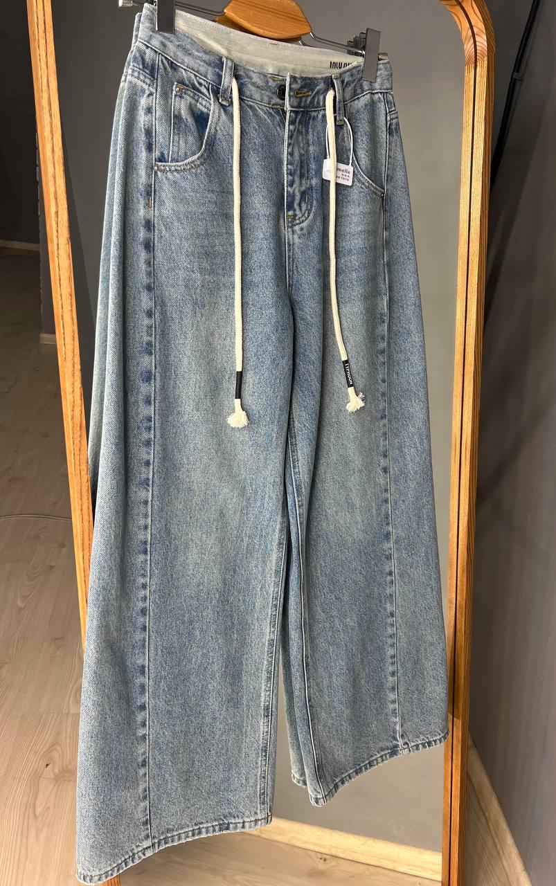 Джинси жіночі Simeile 89616 палаццо широкі зкошений шов попереду висока талія зі шнурком L Блакитний (3539) - фото 6 Джинси жіночі Simeile 89616 палаццо широкі зкошений шов попереду висока талія зі шнурком L Блакитний (3539) - фото 6