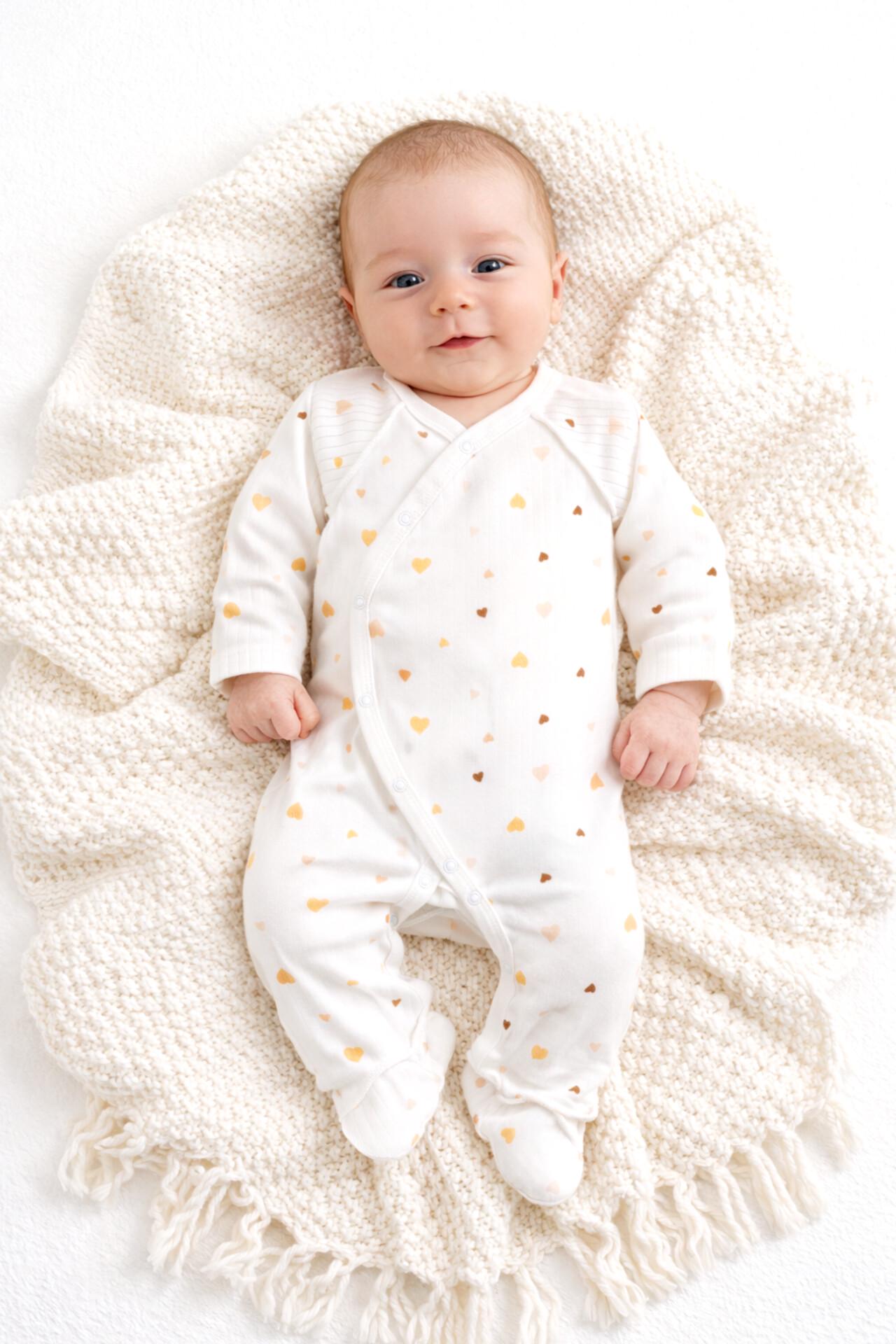 Чоловічок закриті ручки та ніжки в рубчик Тімі текс Помаранчеві сердечка 56 см Молочний