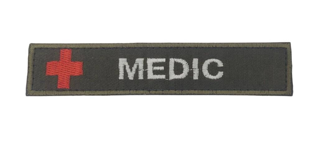 Шеврон нагрудный Medic 2,5х13 см Олива (3585577) Шеврон нагрудный Medic 2,5х13 см Олива (3585577)