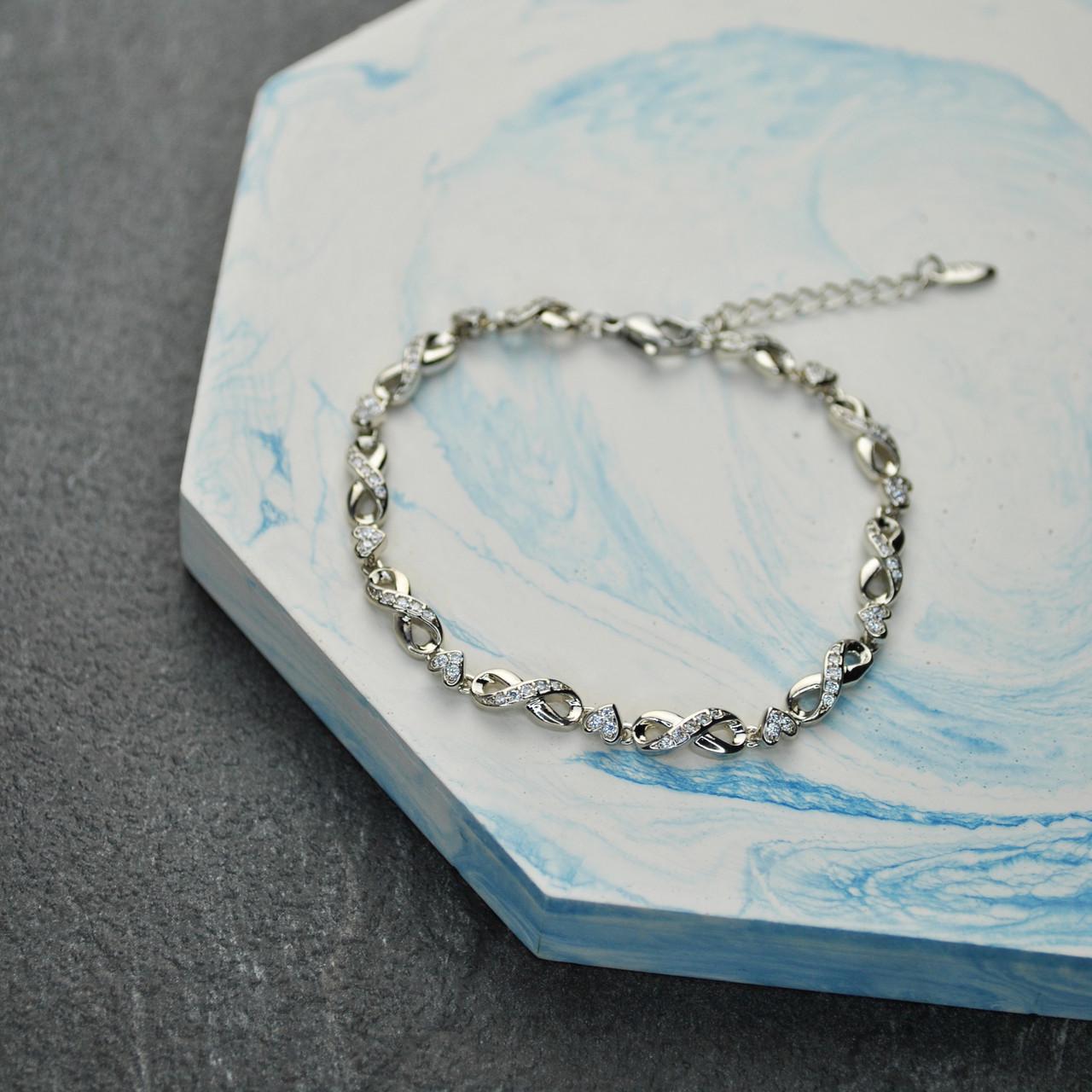 Браслет Бесконечность и сердца медицинская сталь родий (x018)