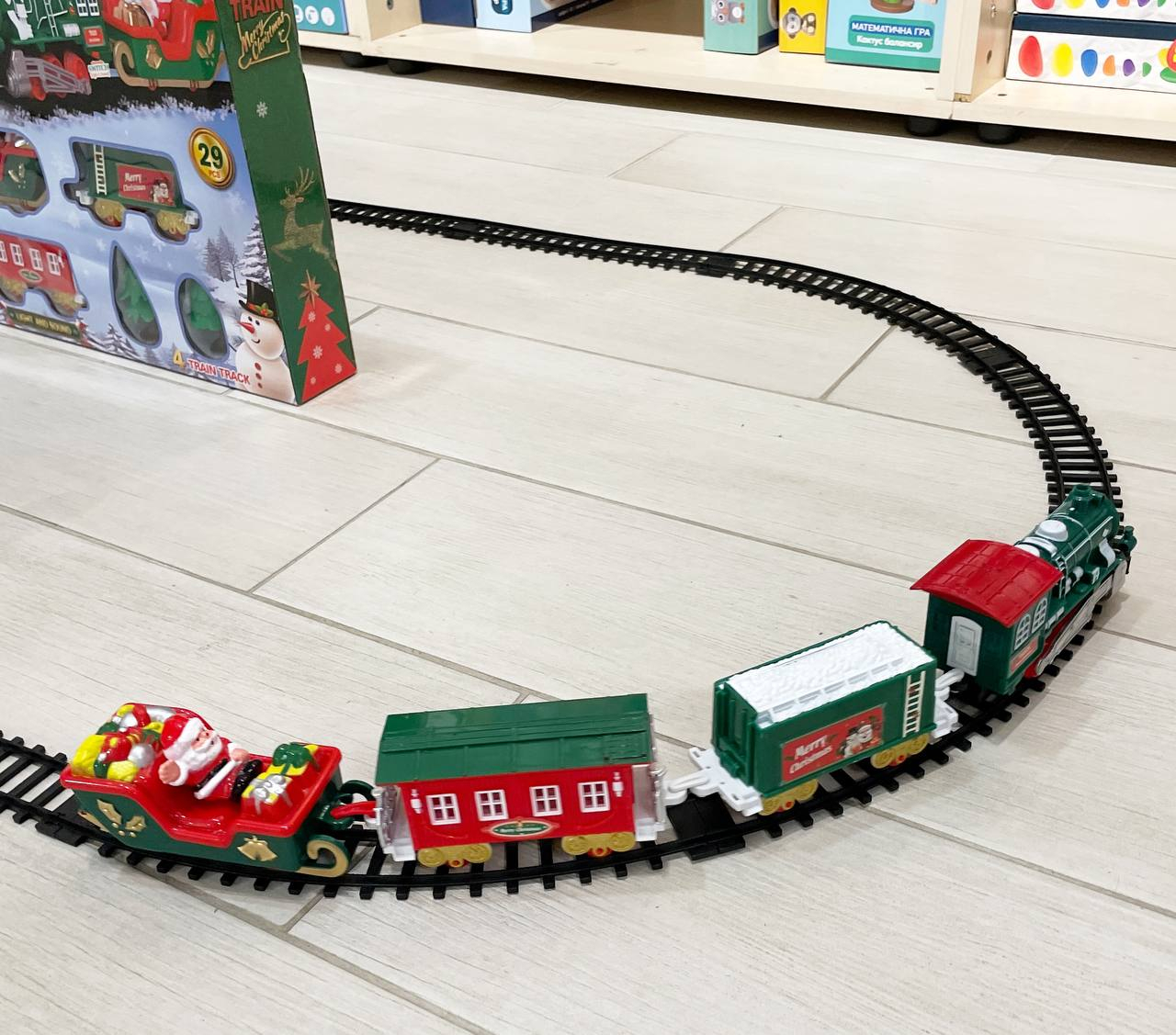 Дитяча залізниця Fun Game JHX6639 Новорічний ЖД локомотив з залізничним полотном до 184 см з звуковими та світловими ефектами (2019259993) - фото 6 Дитяча залізниця Fun Game JHX6639 Новорічний ЖД локомотив з залізничним полотном до 184 см з звуковими та світловими ефектами (2019259993) - фото 6