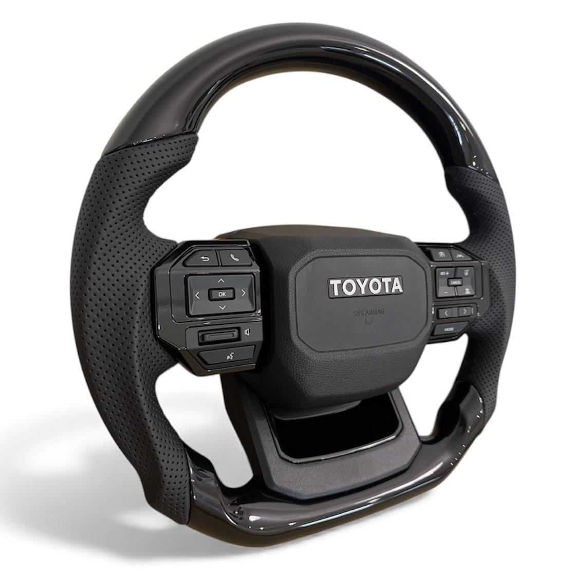 Руль анатомический для Toyota Land Cruiser 100/Prado 120 в стиле Prado 250 логотип хром (30583885) - фото 3 Руль анатомический для Toyota Land Cruiser 100/Prado 120 в стиле Prado 250 логотип хром (30583885) - фото 3