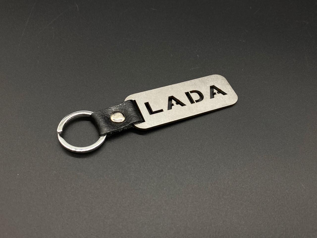 Брелок автомобильный для ключей Lada 10х2,5 см Серебристый (1221834259) Брелок автомобильный для ключей Lada 10х2,5 см Серебристый (1221834259)