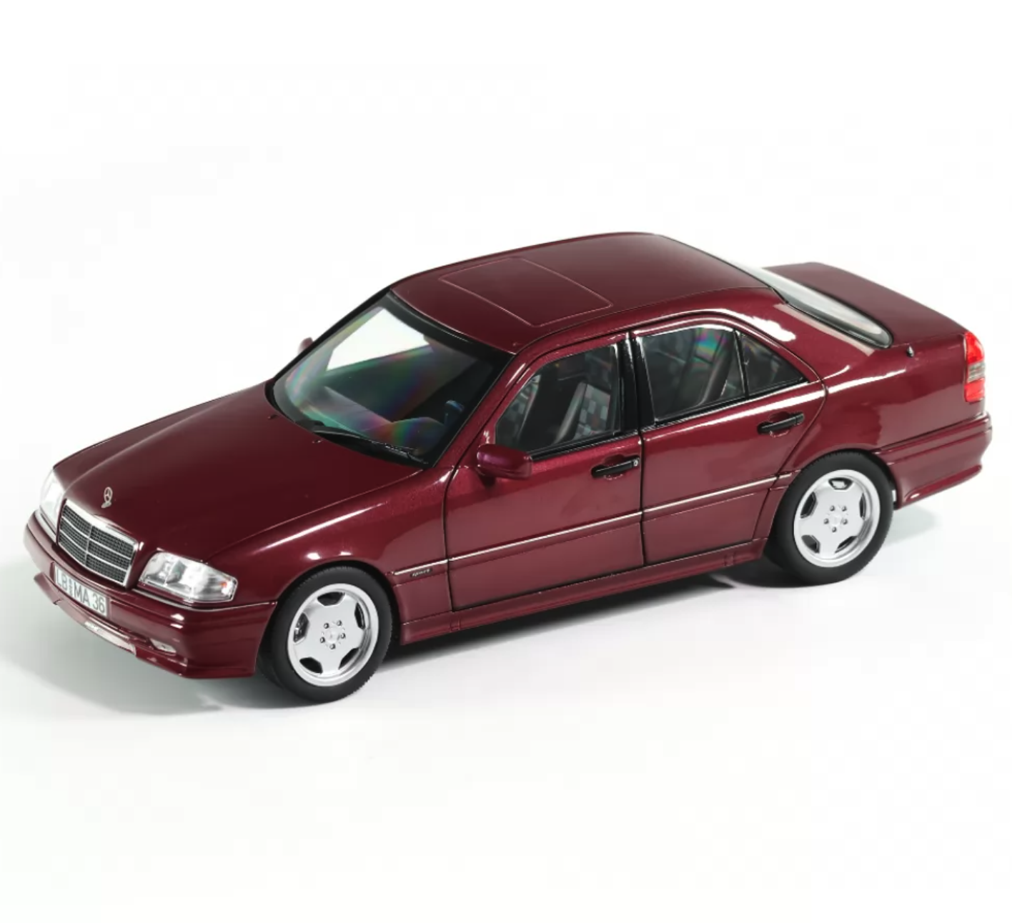 Модель автомобиля Mercedes-Benz C-Class C36 AMG W202 Limousine 1:18 Almandine Red (B66040706) - фото 1