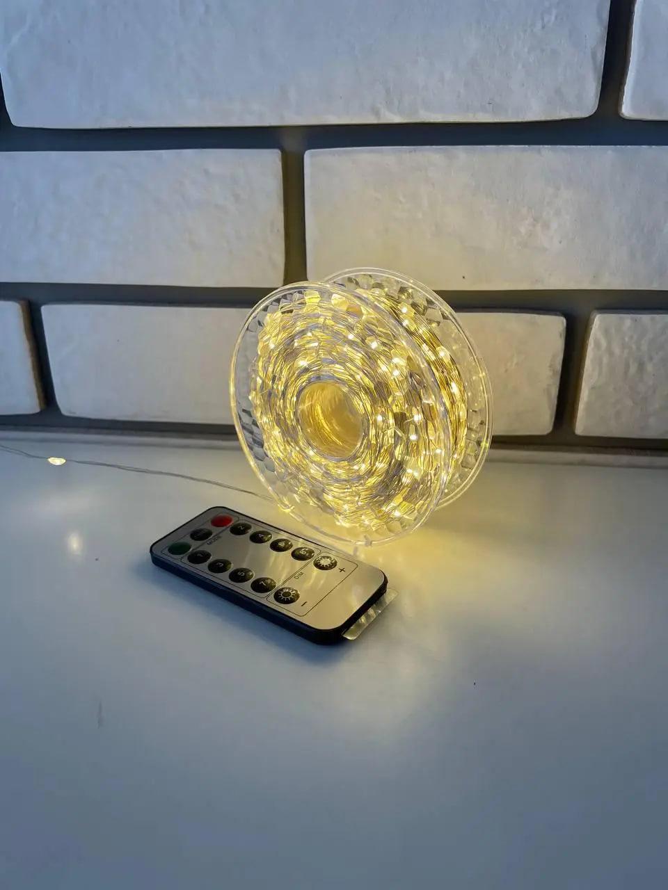 Гірлянда Роса на котушці від мережі з пультом 50 м Білий теплий (577946)