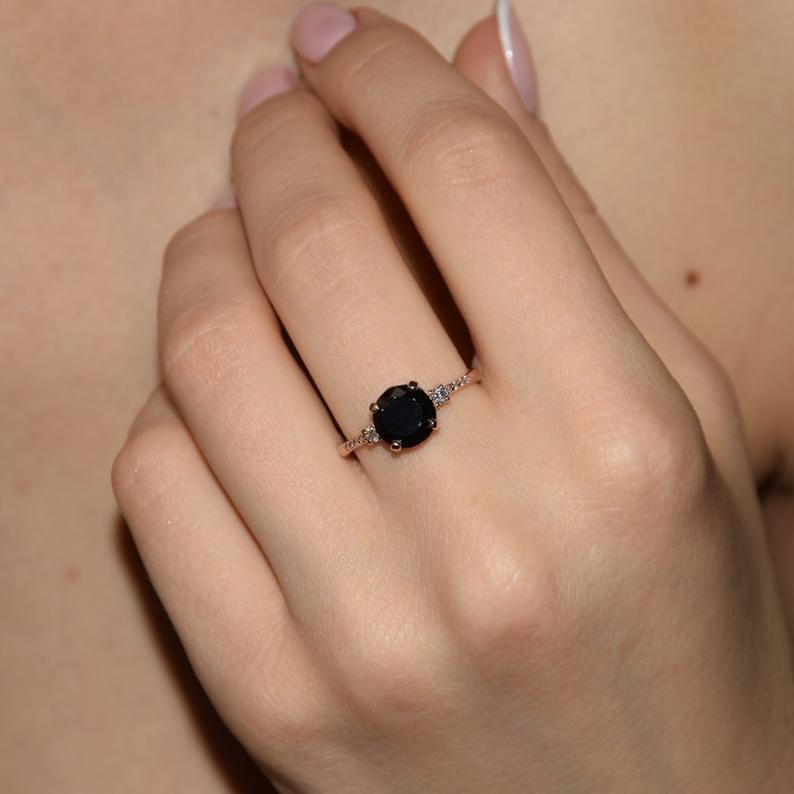 Каблучка з червоного золота з чорним каменем (2245419247)