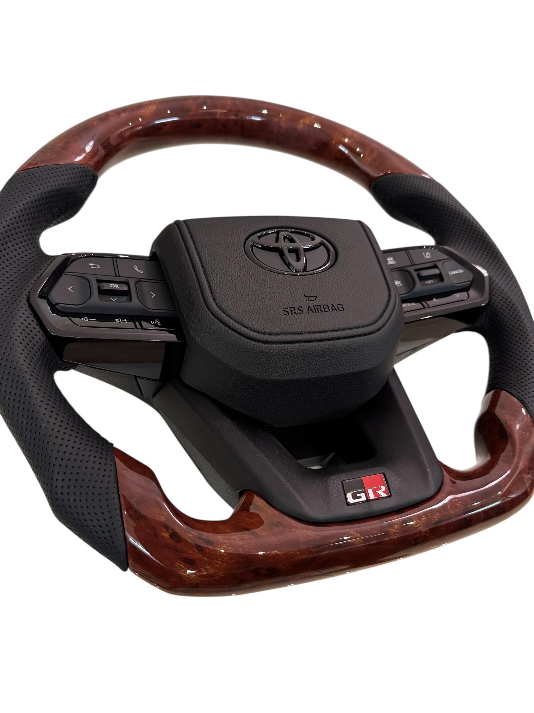 Кермо для Toyota Land Cruiser 100/Prado 120 GR під оригінальний колір салону в сборі зі скошеним низом логотип чорний глянець (30246663) - фото 5