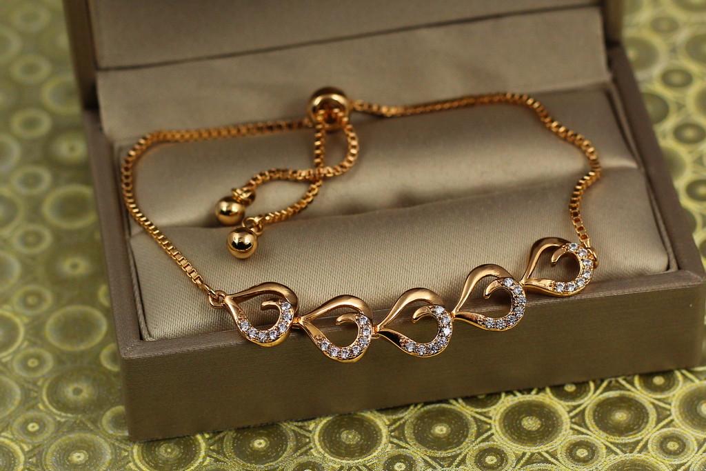 Браслет регулируемый Xuping Jewelry Пять сердец на бегунке Золотистый (2075330524)