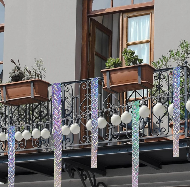 Светоотражающая лента для отпугивания птиц голографическая 5000х5 см Серебристый (2311) - фото 8 Светоотражающая лента для отпугивания птиц голографическая 5000х5 см Серебристый (2311) - фото 8