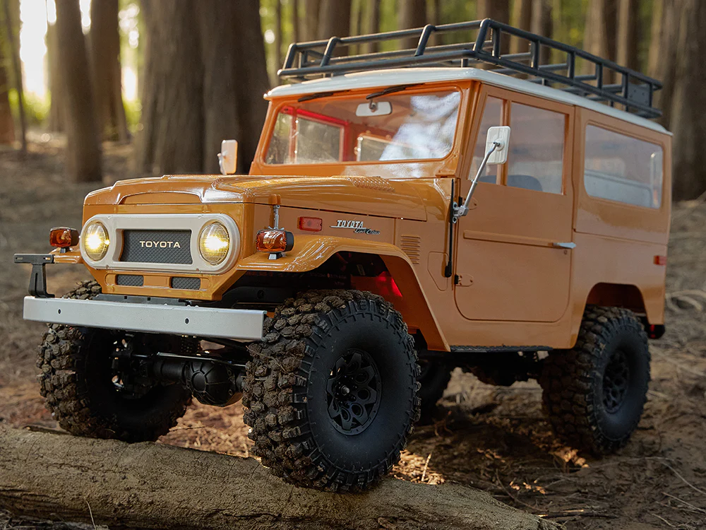 Машинка на радиоуправлении FMS 1:10 Toyota Land Cruiser FJ40 RS Yellow - фото 2 Машинка на радиоуправлении FMS 1:10 Toyota Land Cruiser FJ40 RS Yellow - фото 2
