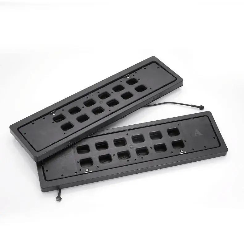 Рамка для номерного знака автомобіля з механізмом обертання (23434310)