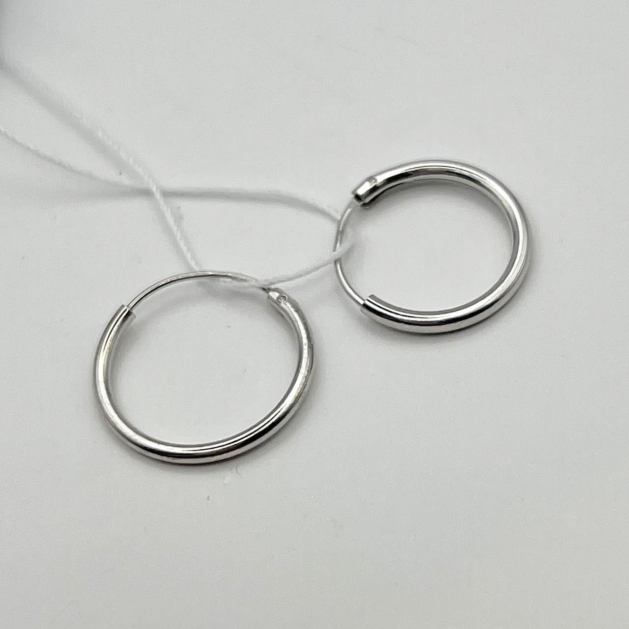 Серебряные серьги-кольца 15 мм 0,75 г (2505788172) Серебряные серьги-кольца 15 мм 0,75 г (2505788172)