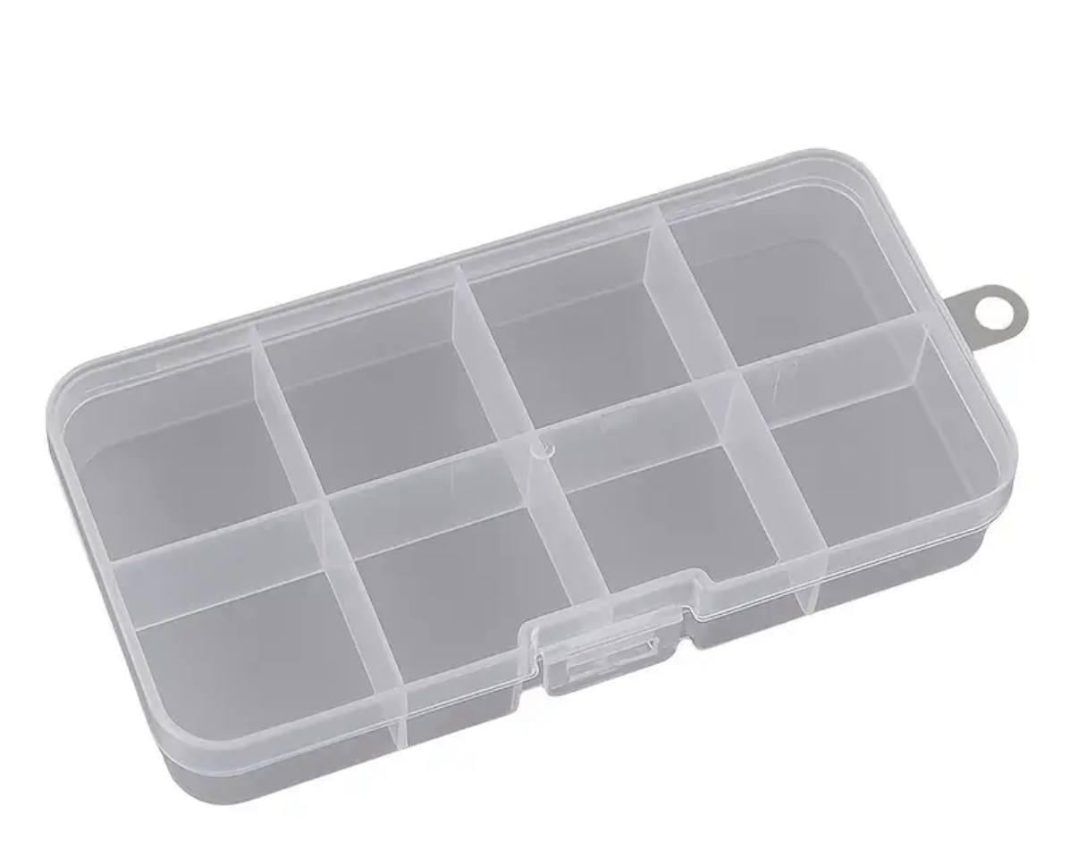 Коробка пластикова для зберігання дрібниць з 8 комірками 13,5х6,5х3 см (Е051551) Коробка пластикова для зберігання дрібниць з 8 комірками 13,5х6,5х3 см (Е051551)