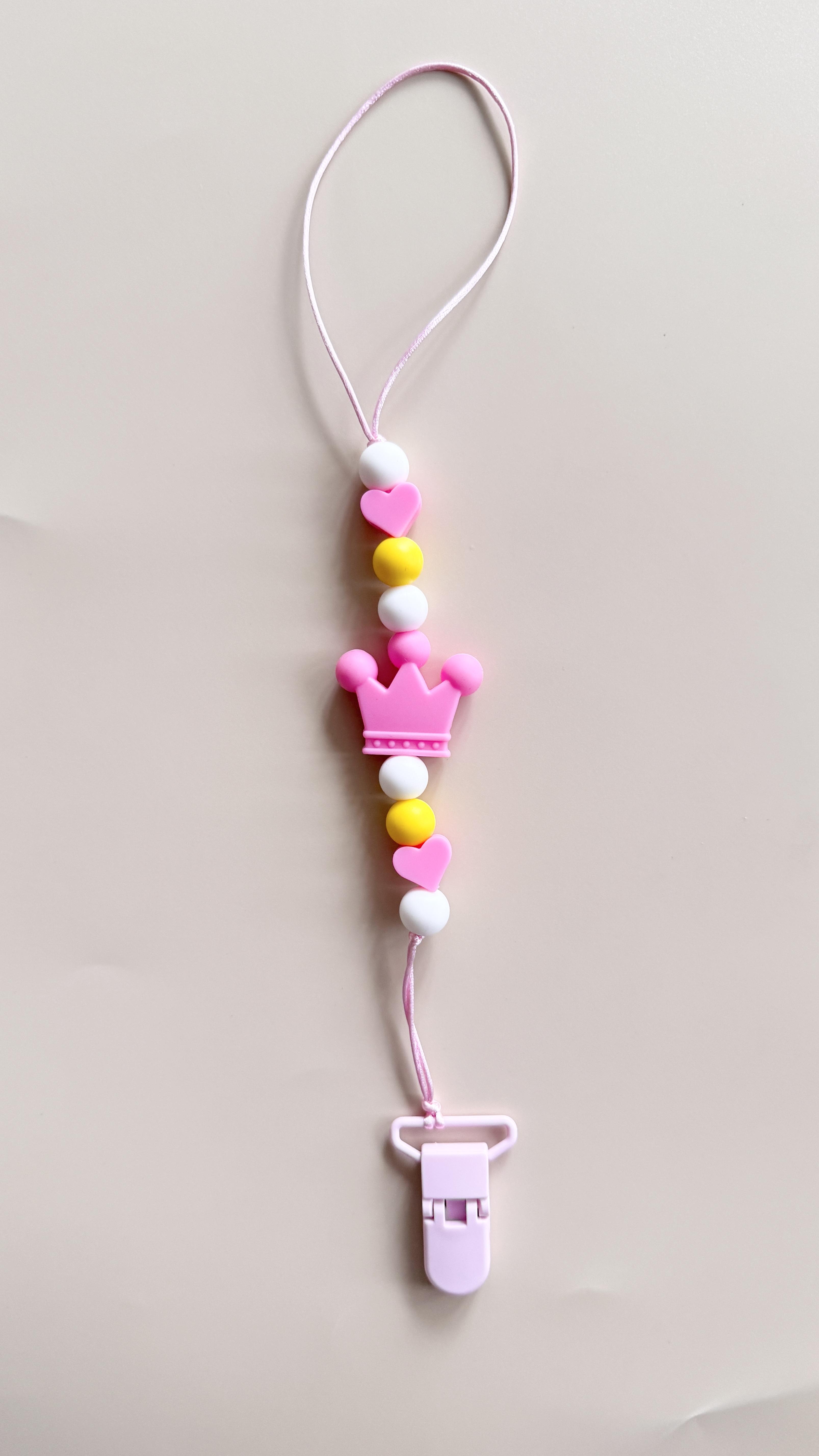 Держатель для пустышки Mommy Bag Корона Розово-лимонный (143986) - фото 2 Держатель для пустышки Mommy Bag Корона Розово-лимонный (143986) - фото 2