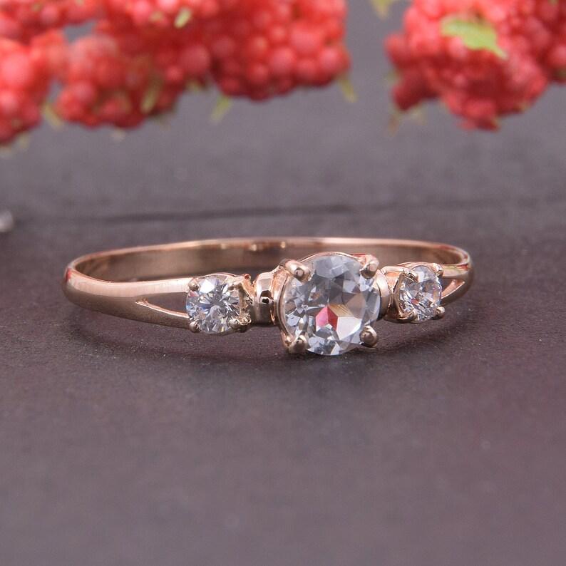 Кільце з червоного золота з білим топазом (2248948777)