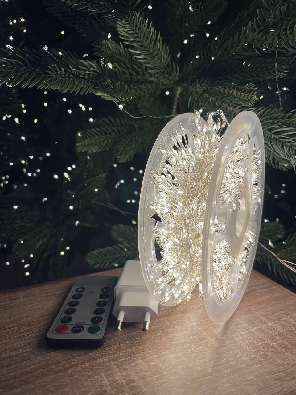 Гирлянда Роса 30 м 900 LED Белый теплый/Серебряный провод (789) Гирлянда Роса 30 м 900 LED Белый теплый/Серебряный провод (789)