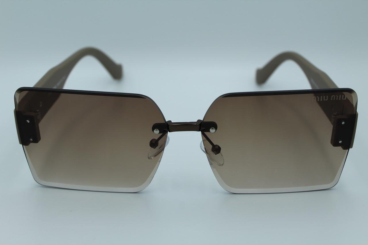 Сонцезахисні окуляри жіночі дизайнерські (58094 №1) - фото 2 Сонцезахисні окуляри жіночі дизайнерські (58094 №1) - фото 2