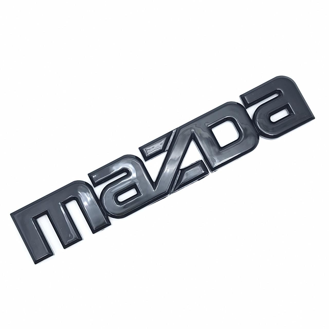 Эмблема надпись Mazda на багажник ABS 14,5х2,5 см Черный глянцевый (2300141049)