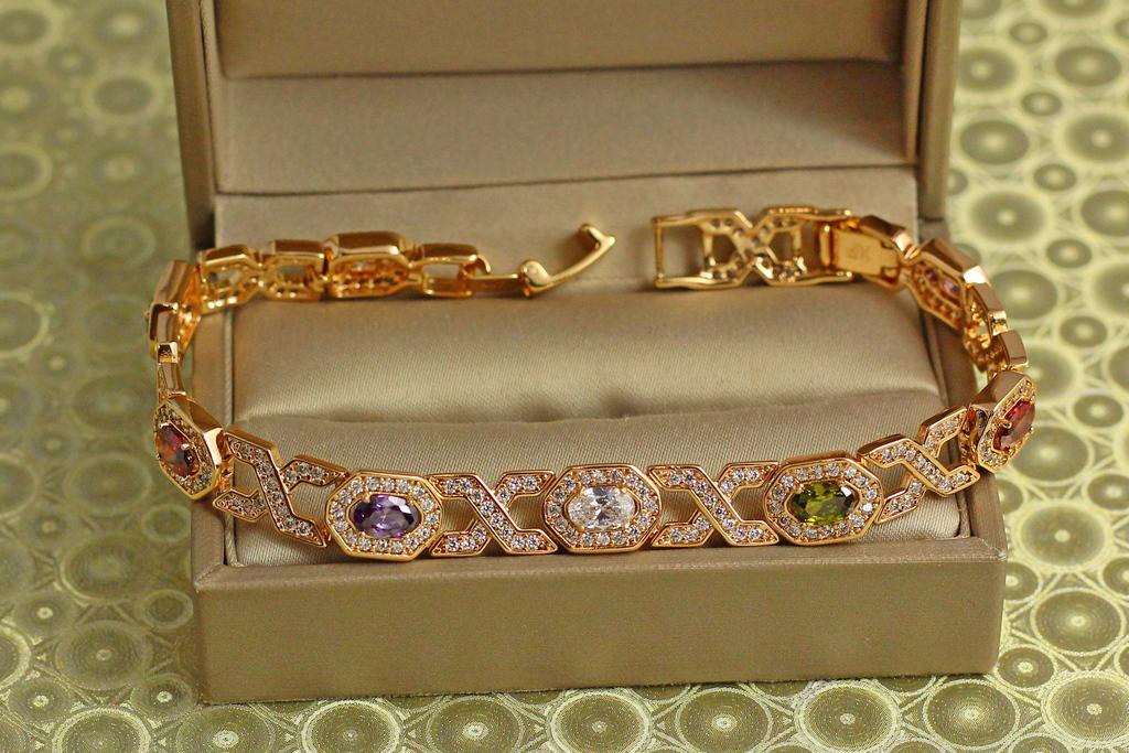 Браслет Xuping Jewelry Вечность с темными разноцветными камнями 19 см 8 мм Золотистый (31717759)