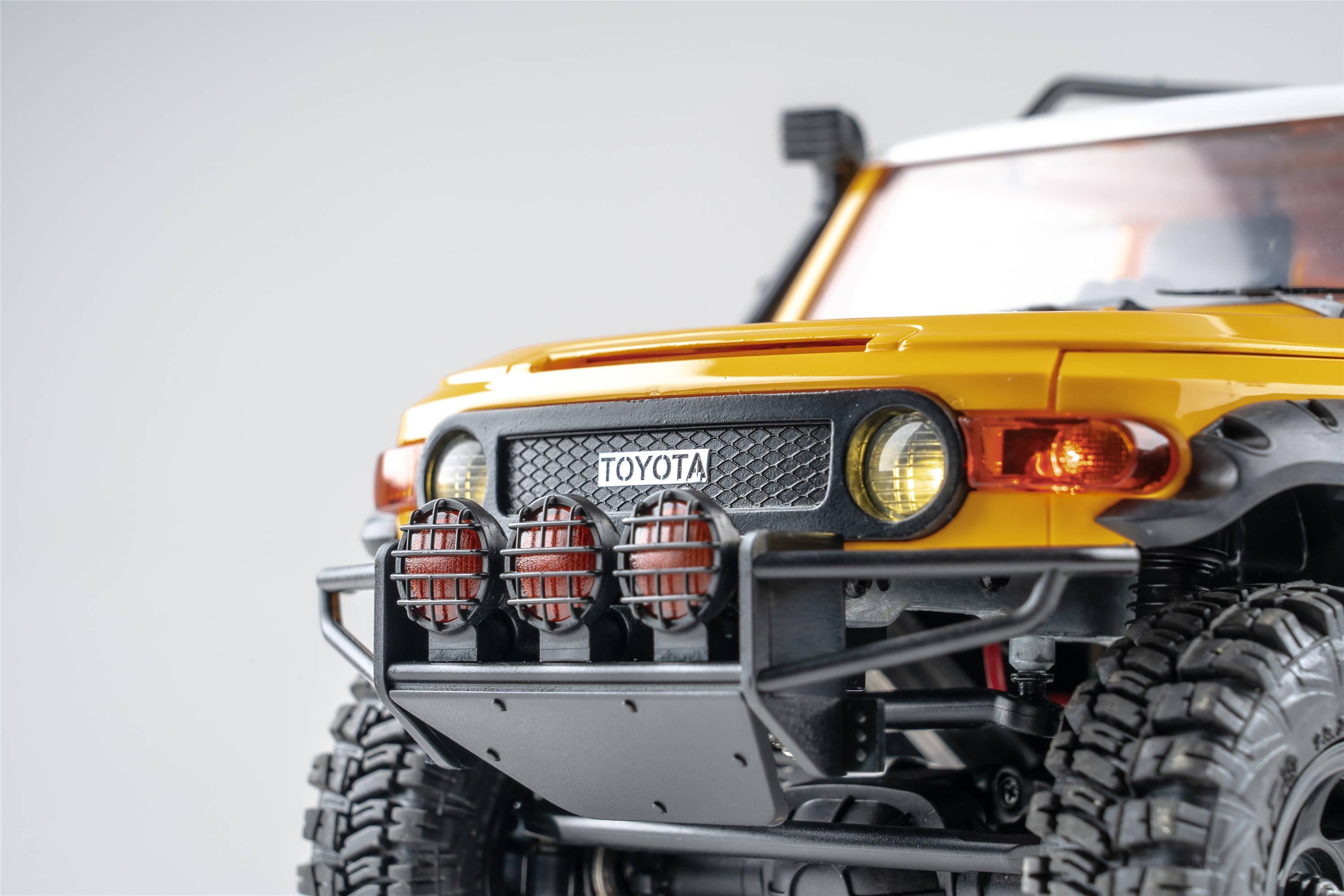 Машинка на радиоуправлении FMS 1:18 FJ Cruiser RTR Yellow - фото 35 Машинка на радиоуправлении FMS 1:18 FJ Cruiser RTR Yellow - фото 35