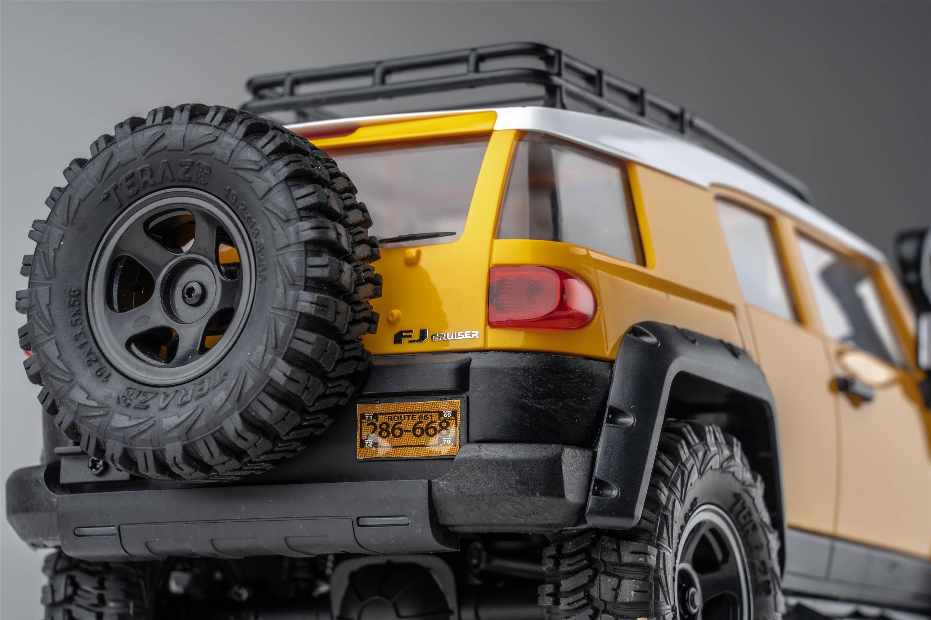 Машинка на радиоуправлении FMS 1:18 FJ Cruiser RTR Yellow - фото 30 Машинка на радиоуправлении FMS 1:18 FJ Cruiser RTR Yellow - фото 30
