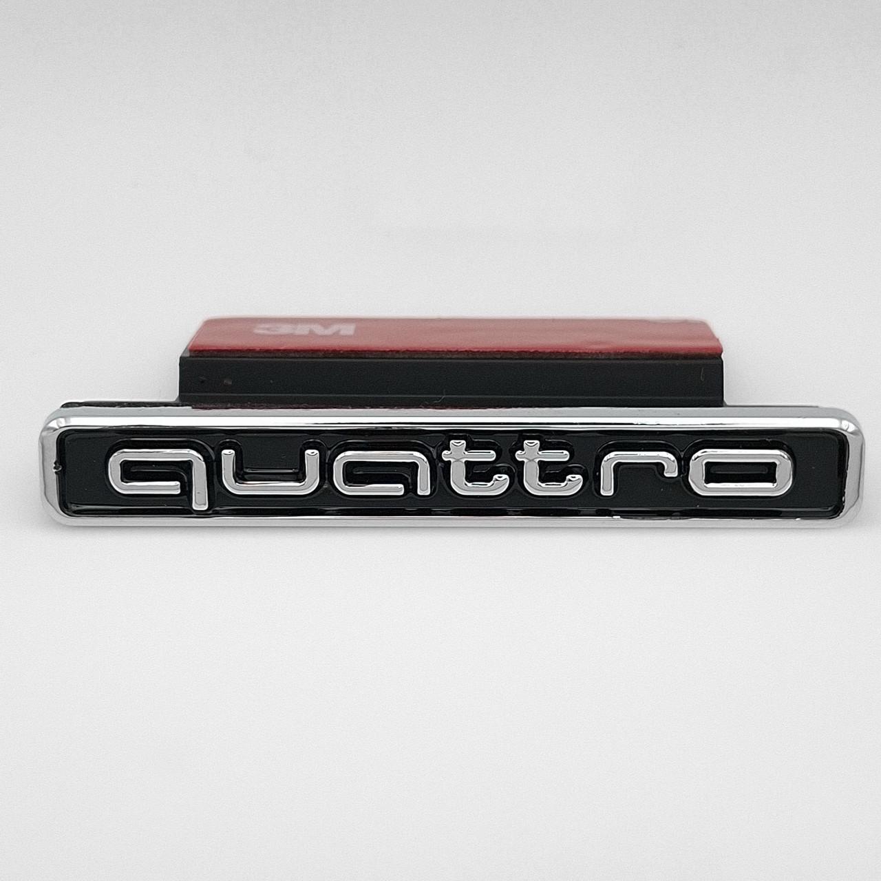 Эмблема радиаторной решетки Quattro Audi 72х10 мм Хром/Черный (A4 B9)