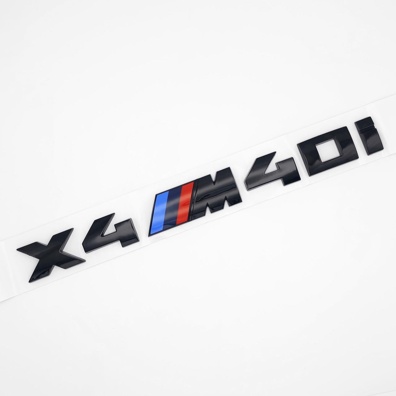 Эмблема надпись X4 M 40I BMW 27,7х2,7 см ABS Черный глянцевый (3038168150)