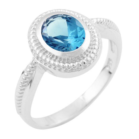 Кольцо серебряное с топазом Лондон Блю 4 г р. 18 (1634226)