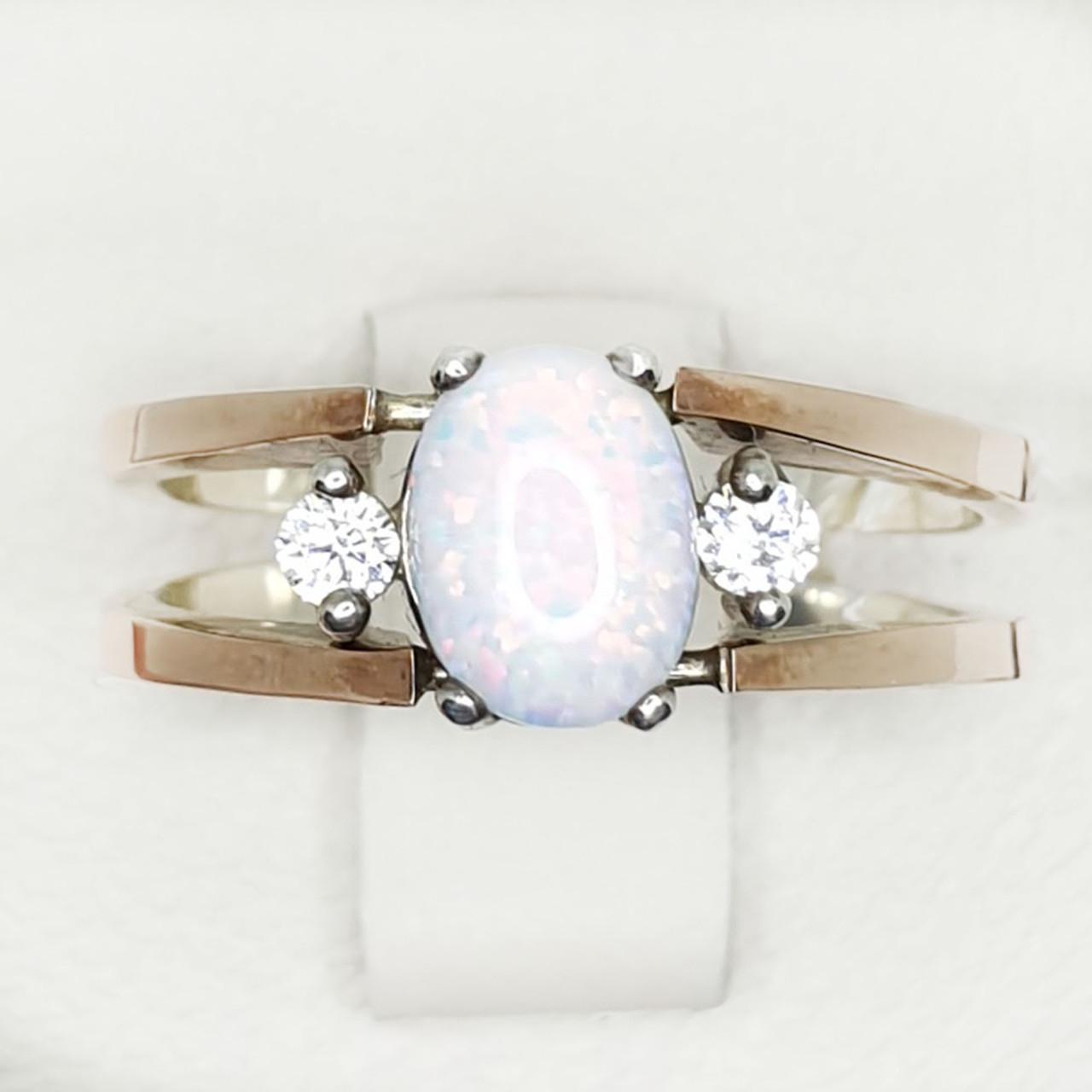 Кольцо серебряное с опалом р. 19,5 4,46 г (1416706133)