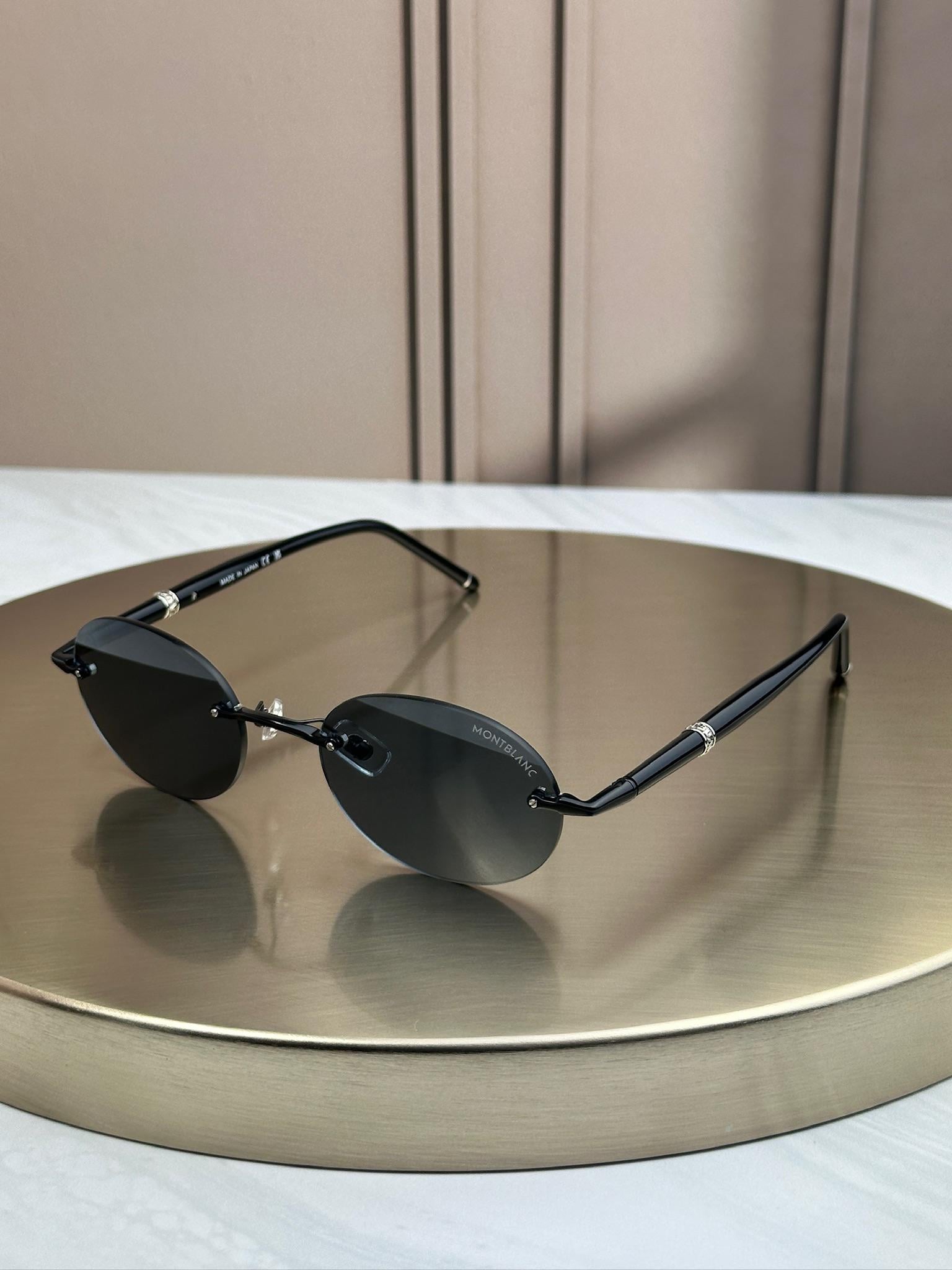 Солнцезащитные очки Montblanc MB0415S безободочные овальные синие мужские линза Черный