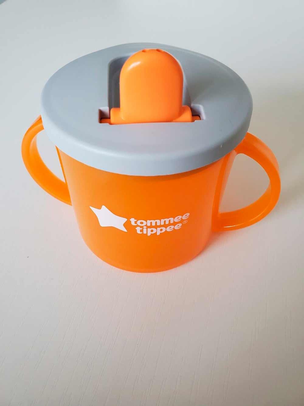 Чашка Tommee Tippee First з ручками 4 міс 190 мл Помаранчевий (TT0049-PORTOCALIU) - фото 2 Чашка Tommee Tippee First з ручками 4 міс 190 мл Помаранчевий (TT0049-PORTOCALIU) - фото 2