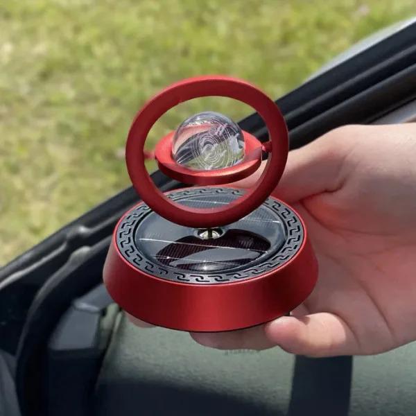 Ароматизатор в машину на сонячній батареї кільця що обертаються (33506-1)