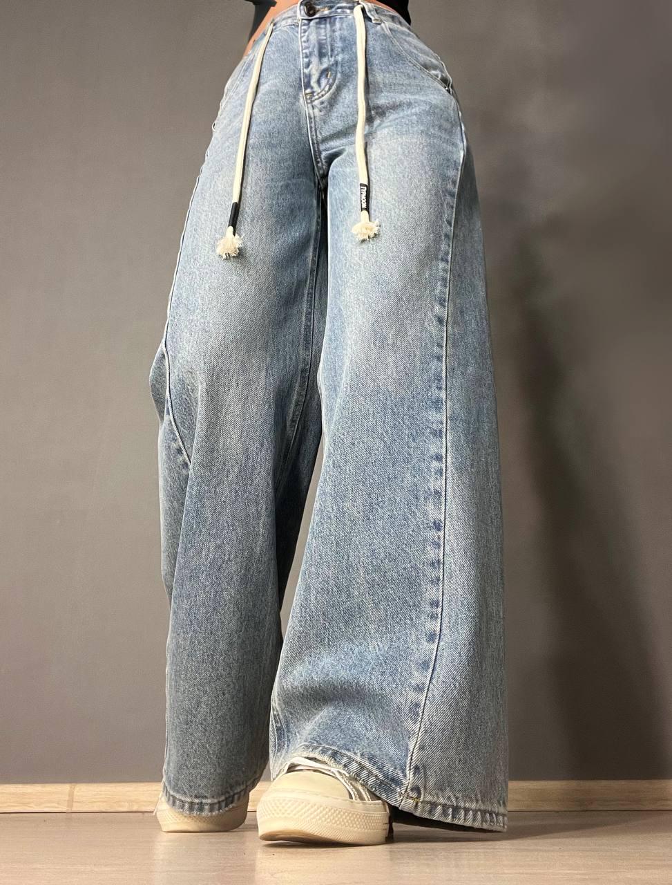 Джинсы женские Simeile 89616 палаццо широкие скошенный шов впереди высокая талия со шнурком S Голубой (3537)