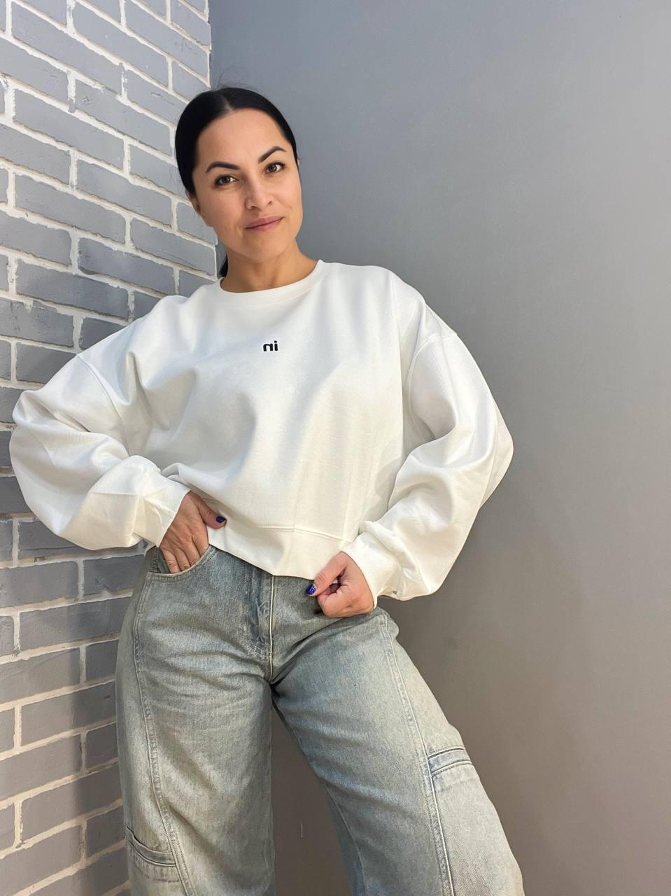 Світшот жіночий U S 36918 рубчик діагональ маленька вишивка in широкий OS Білий (1384) Світшот жіночий U S 36918 рубчик діагональ маленька вишивка in широкий OS Білий (1384)